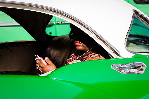 Taxi Passenger with iPhone, Paseo del Prado, Centro Habana