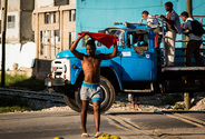 Youth holding Red Vest, Paseo de Marti, Santiago de Cuba